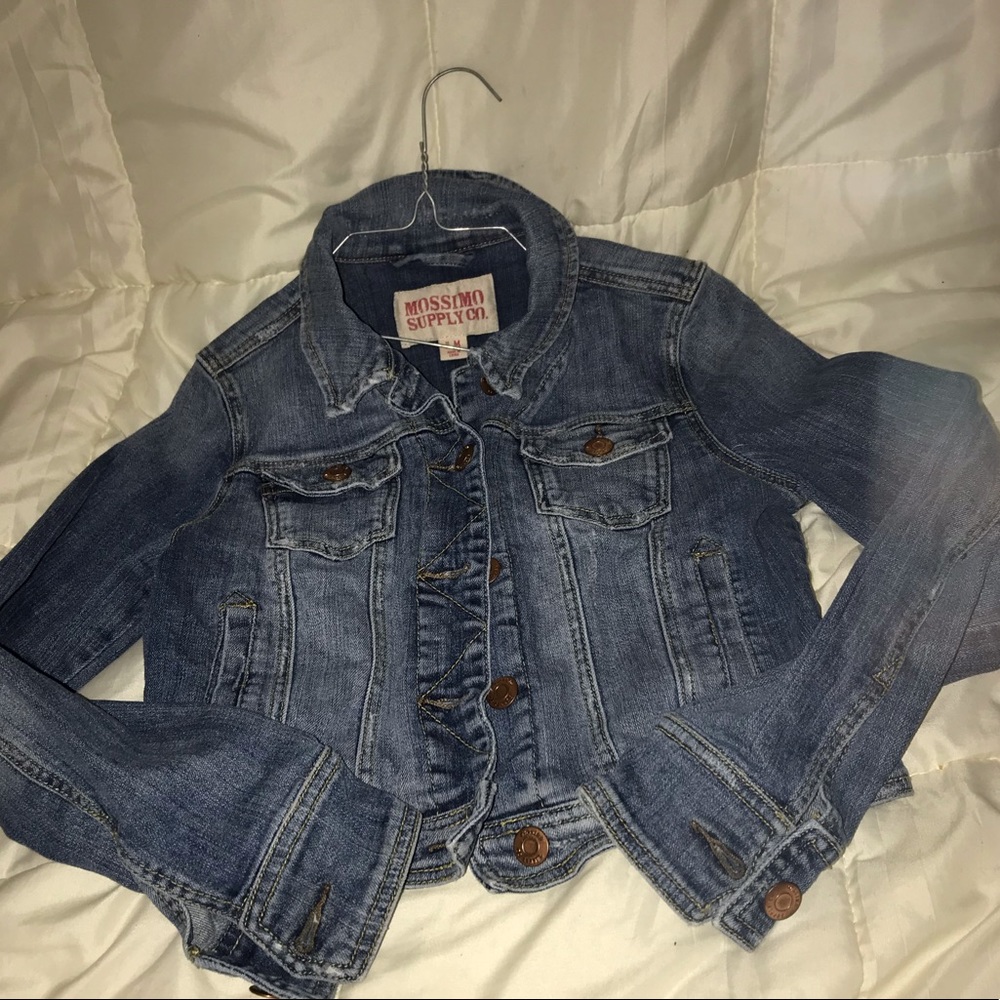 Woman’s Blue Jean jacket. Not a full length.